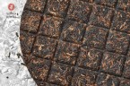 Shu pu-erh „Okrągła czekoladka” (Ban Zhang Gu Shu), 2006 r., 180 g.