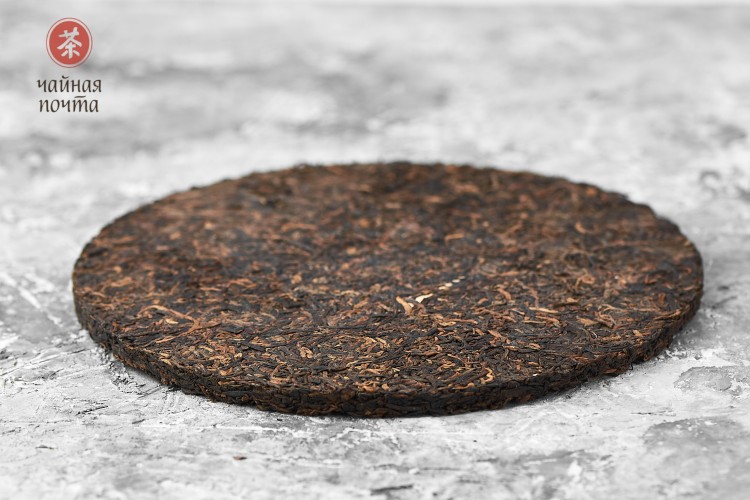 Shu pu-erh „Okrągła czekoladka” (Ban Zhang Gu Shu), 2006 r., 180 g.