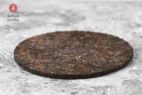 Shu pu-erh „Okrągła czekoladka” (Ban Zhang Gu Shu), 2006 r., 180 g.