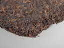 Shu Puer „Wino z drewna” (Mu Ye Chun 001), Mengku, 2022, 400 g.