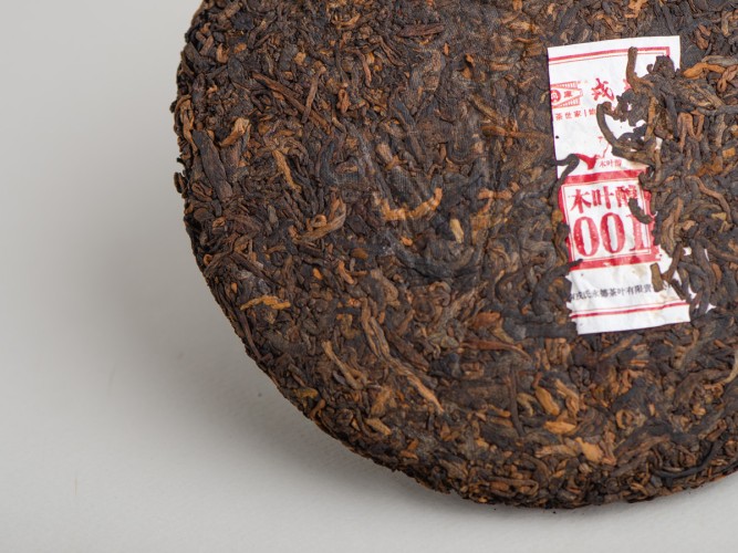 Shu Puer „Wino z drewna” (Mu Ye Chun 001), Mengku, 2022, 400 g.